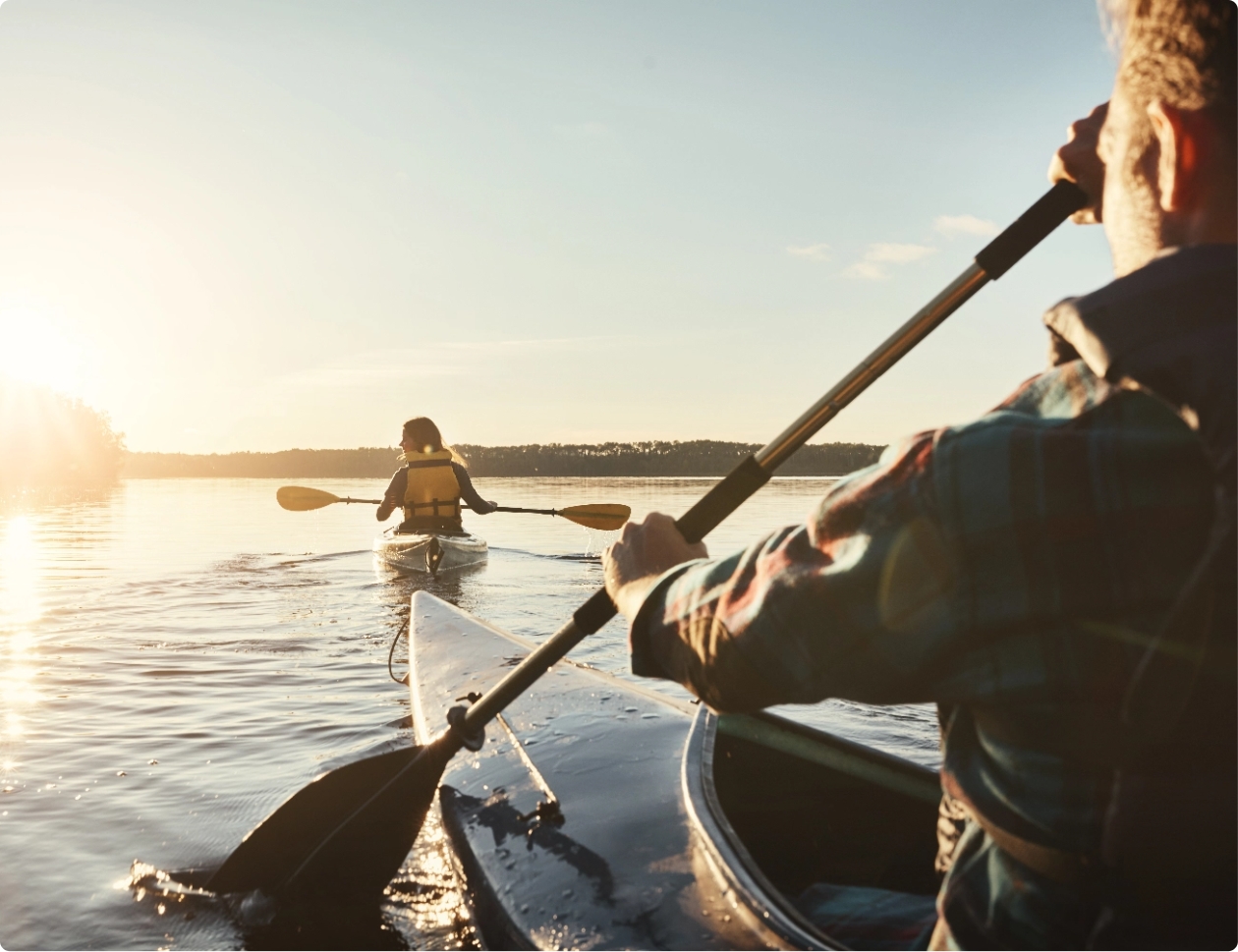 Man & Woman Kayaking in Nature