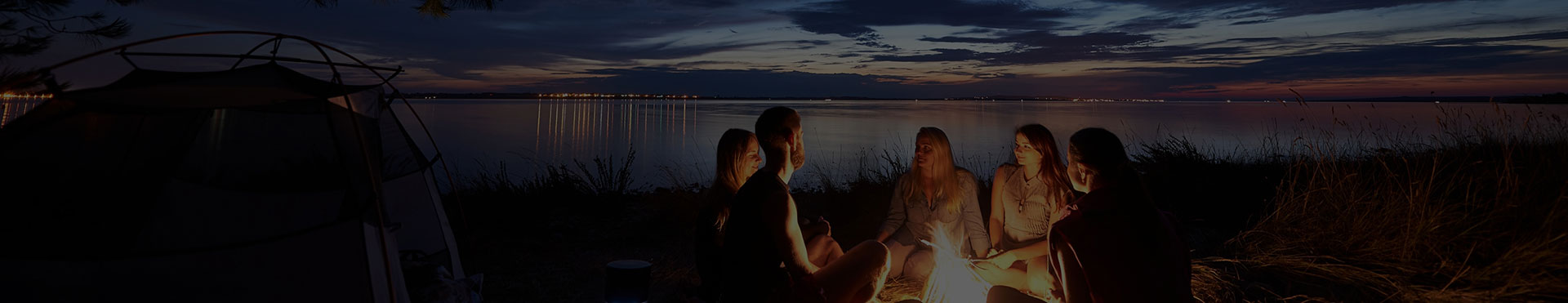 Friends in Night Camping Gear